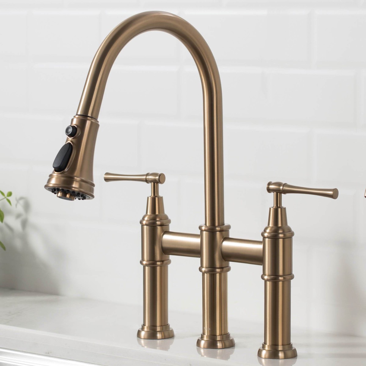 KRAUS Allyn Bridge Faucet with Pull-Down Sprayhead in Brushed Gold