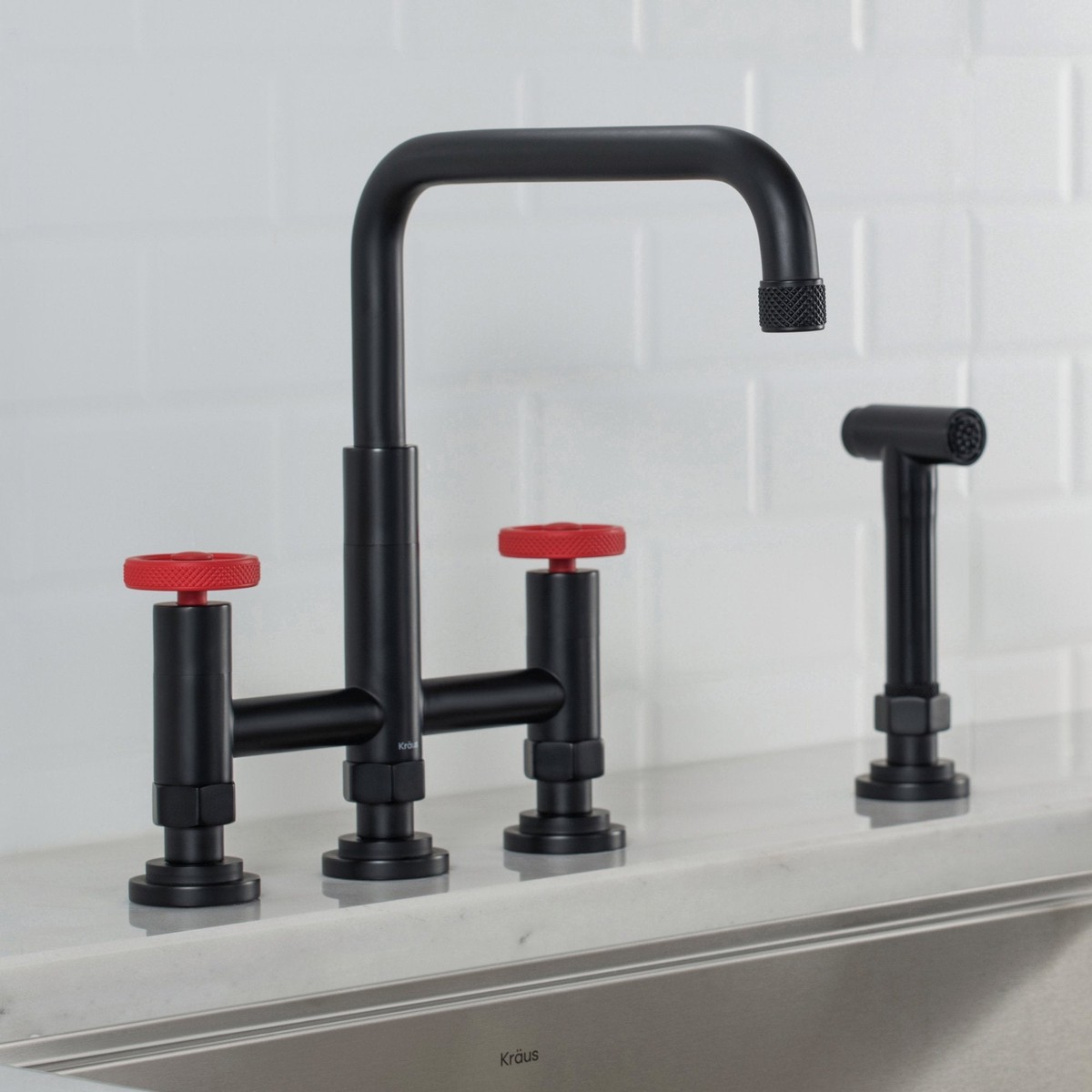 KRAUS Urbix Bridge Kitchen Faucet with Side Sprayer in Matte BlackRed